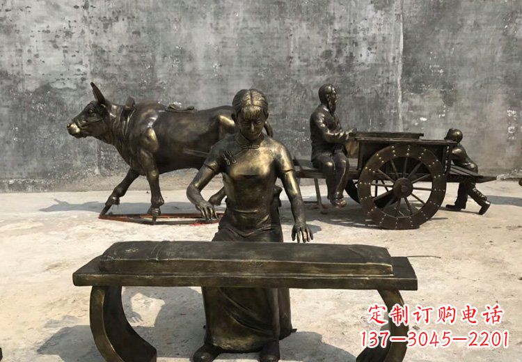 开封弹古筝的美女铜雕