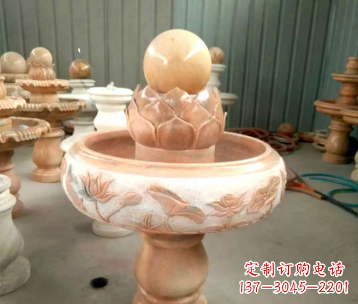 开封石来运转晚霞红风水球喷泉石雕