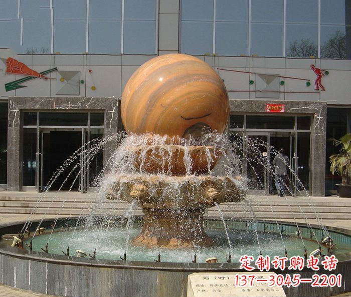 开封石来运转球晚霞红风水球石雕