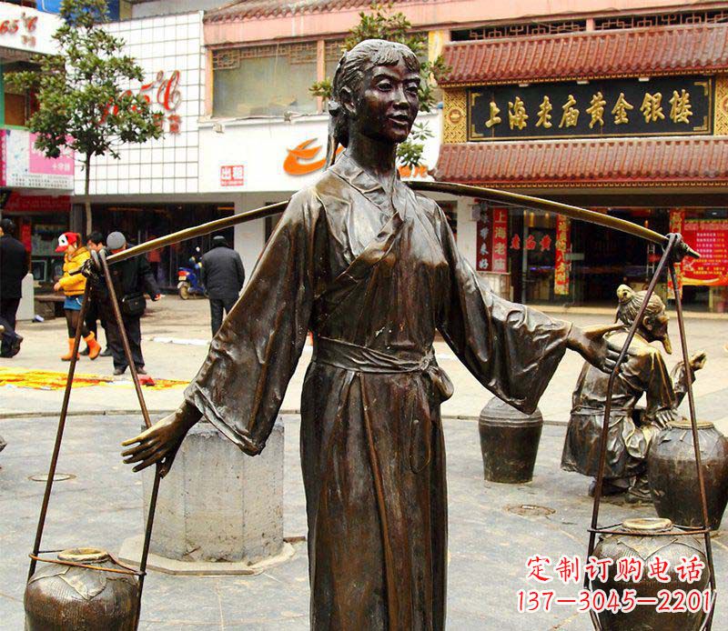 开封挑着罐子的古代女人铜雕
