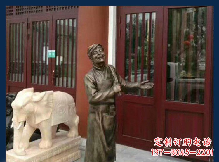 开封铜雕店小二酒店迎宾人物雕塑