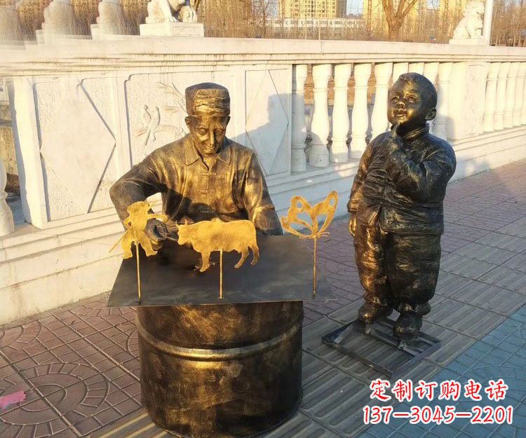 开封铜雕画糖人的人物