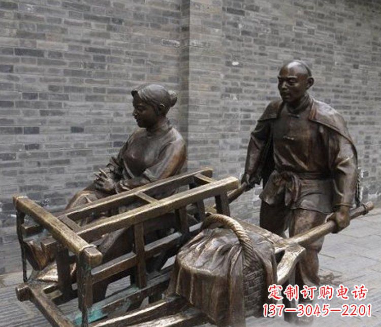开封推独轮车的人物铜雕