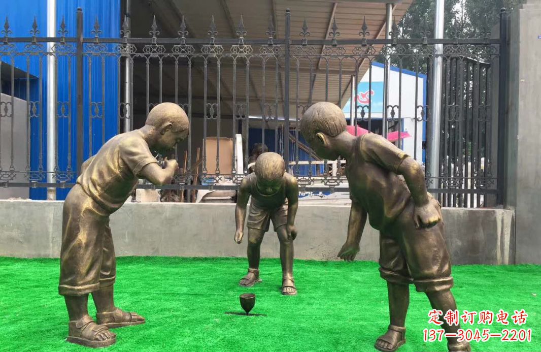 开封玩陀螺儿童铜雕塑