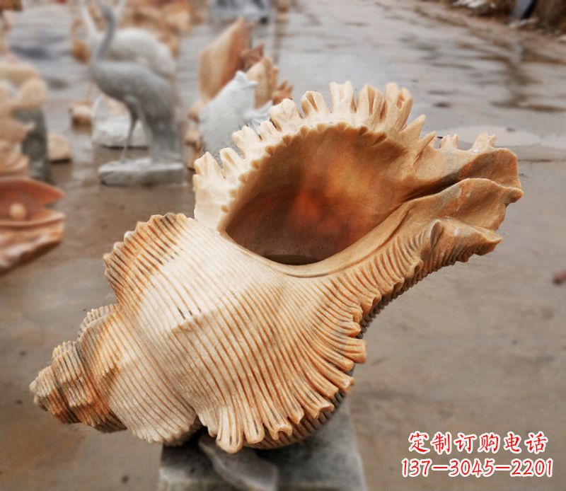 开封晚霞红海螺石雕广场景观雕塑