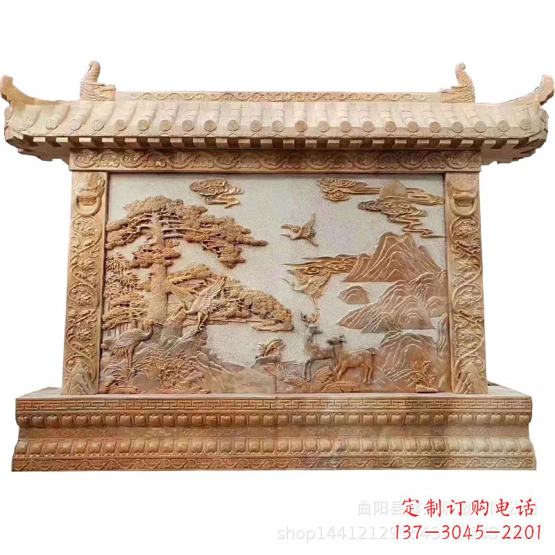 开封晚霞红迎客松石雕影壁