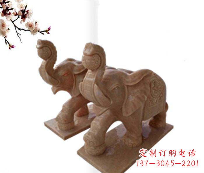 开封象鼻朝天的大象晚霞红招财石雕