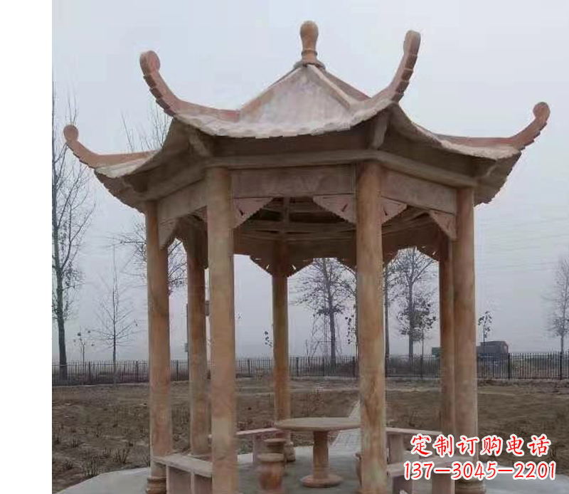 开封公园晚霞红八角石雕凉亭