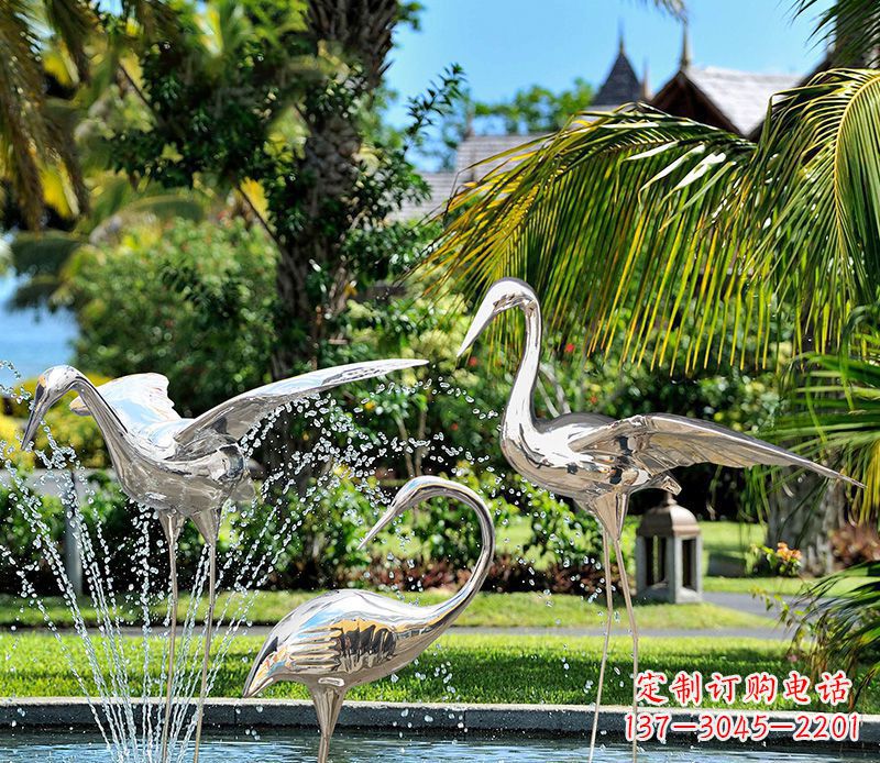 开封鹤雕塑-公园池塘不锈钢镜面抽象喷泉中的鹤雕塑