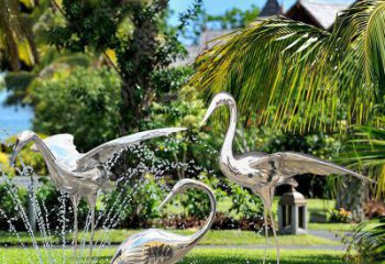开封鹤雕塑-公园池塘不锈钢镜面抽象喷泉中的鹤雕塑